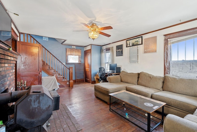 107 Portland St, Fryeburg, ME 04037 - living area featuring ornamental molding, hardwood / wood-style flooring, stairs, and ceiling fan