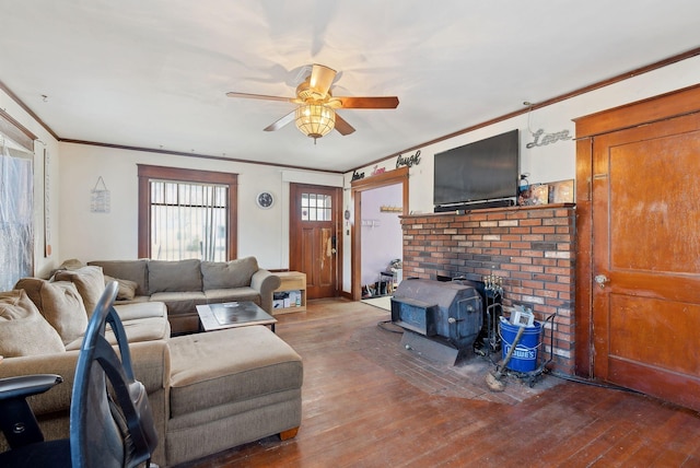 107 Portland St, Fryeburg, ME 04037 - living area featuring wood-type flooring, crown molding, ceiling fan, and a wood stove