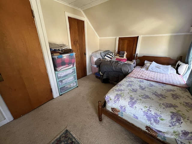 38 Access Hwy, Limestone, ME 04750 - carpeted bedroom featuring ornamental molding and vaulted ceiling