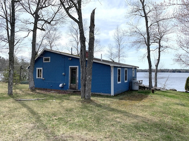 21 Coyote Ln, Meddybemps, ME 04657 - rear view of property featuring a yard and a water view