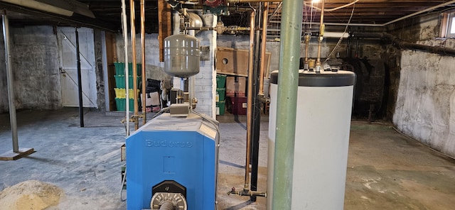 612 Franklin St, Rumford, ME 04276 - unfinished below grade area featuring gas water heater and a heating unit