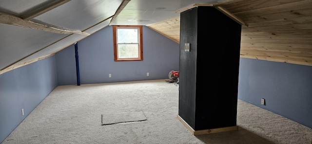 612 Franklin St, Rumford, ME 04276 - additional living space with carpet flooring and vaulted ceiling