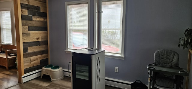 612 Franklin St, Rumford, ME 04276 - office with a baseboard heating unit and dark wood-type flooring