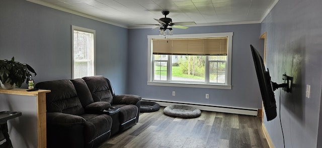 612 Franklin St, Rumford, ME 04276 - sitting room featuring ornamental molding, a baseboard heating unit, wood finished floors, a ceiling fan, and baseboards