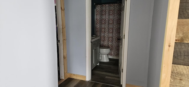 612 Franklin St, Rumford, ME 04276 - full bath featuring toilet, wood finished floors, and baseboards