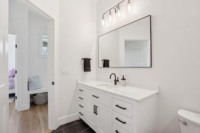 68 Green Acres Dr, Buxton, ME 04093 - bathroom with tile patterned floors, vanity, baseboards, and toilet