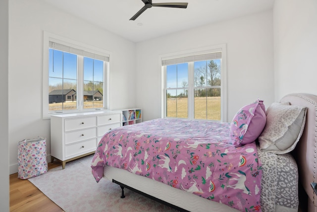 68 Green Acres Dr, Buxton, ME 04093 - bedroom featuring a ceiling fan and wood finished floors