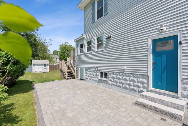 53 Ocean View Ave, South Portland, ME 04106 - view of patio with entry steps and an outbuilding