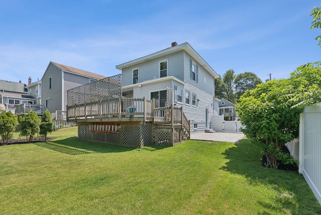 53 Ocean View Ave, South Portland, ME 04106 - back of property with a deck, a chimney, and stairway