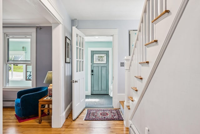53 Ocean View Ave, South Portland, ME 04106 - foyer featuring stairs, baseboard heating, and light wood-style floors