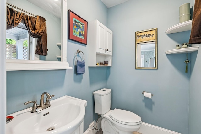 53 Ocean View Ave, South Portland, ME 04106 - bathroom featuring a sink and baseboards