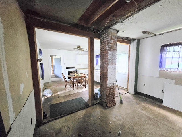 27 Cannard St, Gardiner, ME 04345 - interior space featuring ornate columns, concrete floors, and a ceiling fan