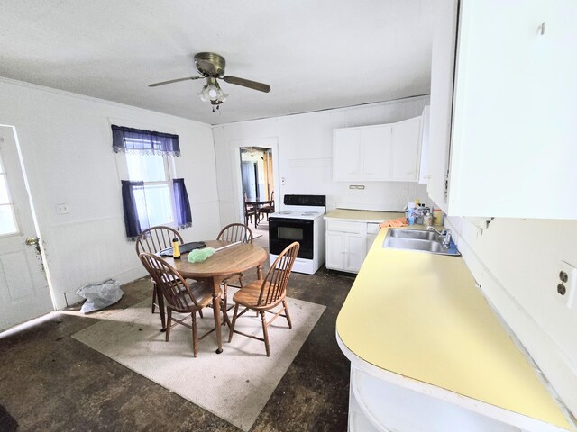 27 Cannard St, Gardiner, ME 04345 - dining room with ceiling fan and concrete floors