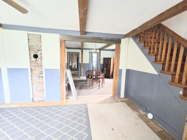 27 Cannard St, Gardiner, ME 04345 - basement featuring a wainscoted wall and stairway