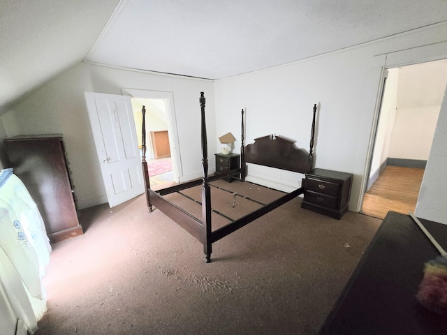 27 Cannard St, Gardiner, ME 04345 - bedroom featuring lofted ceiling, carpet, and baseboards