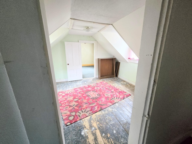 27 Cannard St, Gardiner, ME 04345 - bonus room featuring lofted ceiling and hardwood / wood-style floors