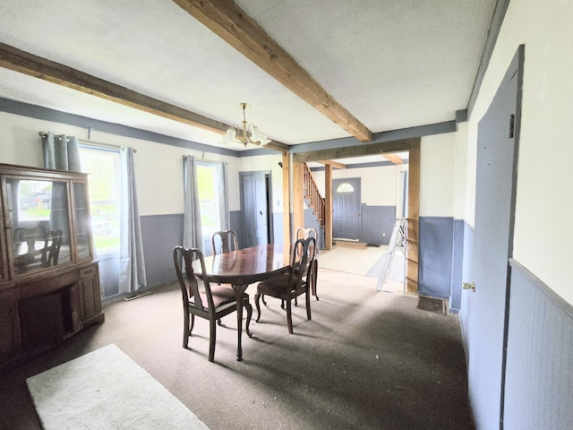 27 Cannard St, Gardiner, ME 04345 - dining room featuring stairs, wainscoting, a chandelier, and beamed ceiling
