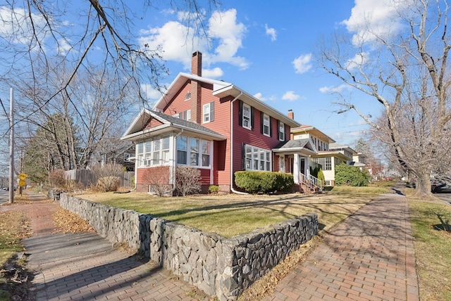 218 Bradley St, Portland, ME 04103 - view of front facade with a chimney