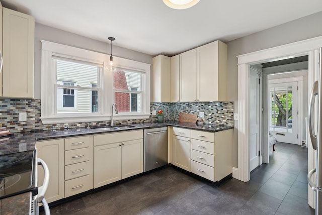 218 Bradley St, Portland, ME 04103 - kitchen with a sink, appliances with stainless steel finishes, tasteful backsplash, and decorative light fixtures