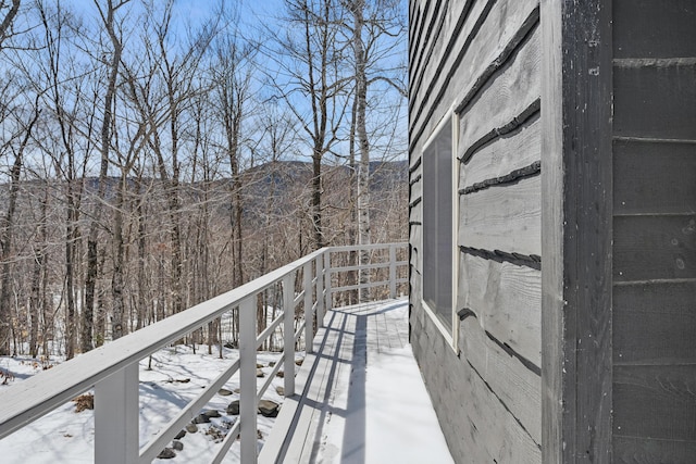 view of snow covered deck