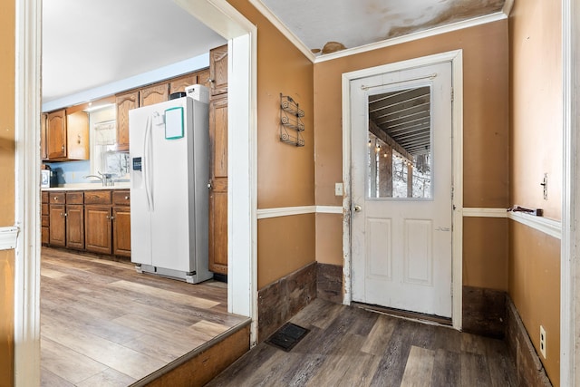 entrance foyer featuring visible vents and light wood-style floors