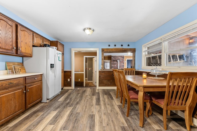 dining space featuring light wood finished floors