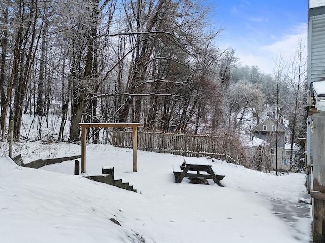 view of yard covered in snow