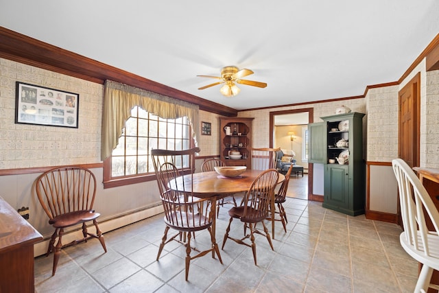 227 Greely Rd, Cumberland, ME 04021 - dining room featuring a wainscoted wall, ornamental molding, ceiling fan, and wallpapered walls
