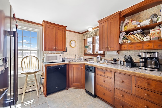 227 Greely Rd, Cumberland, ME 04021 - kitchen with decorative backsplash, dishwasher, a sink, stainless steel fridge with ice dispenser, and white microwave
