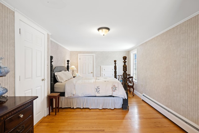 227 Greely Rd, Cumberland, ME 04021 - bedroom featuring ornamental molding, wallpapered walls, light wood-style floors, and a baseboard radiator