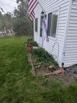 749 W River Rd, Waterville, ME 04901 - view of side of home featuring a lawn