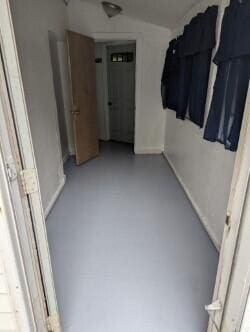 749 W River Rd, Waterville, ME 04901 - corridor featuring baseboards