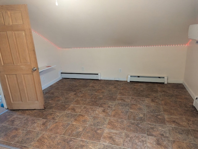 749 W River Rd, Waterville, ME 04901 - spare room with a baseboard radiator, baseboard heating, baseboards, and stone finish floors