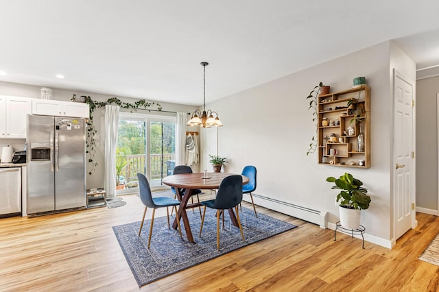 dining space featuring baseboard heating, light wood-type flooring, baseboards, recessed lighting, and an inviting chandelier