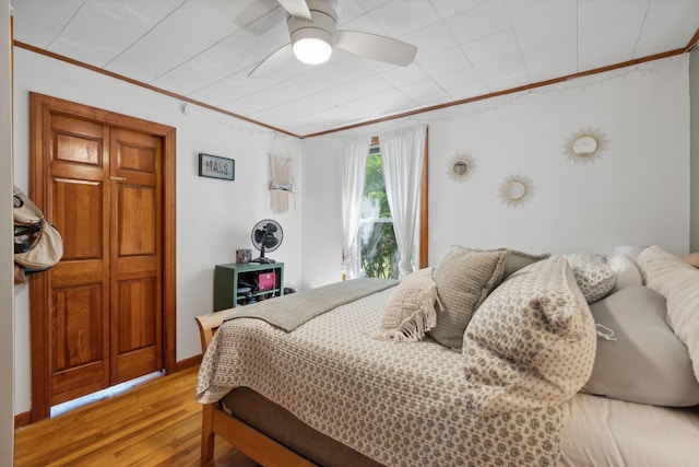 23-25 Deerfield Rd, Portland, ME 04101 - bedroom featuring ornamental molding, light wood-style floors, and a ceiling fan