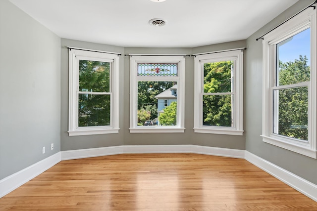 23-25 Deerfield Rd, Portland, ME 04101 - spare room with light wood-style floors and baseboards