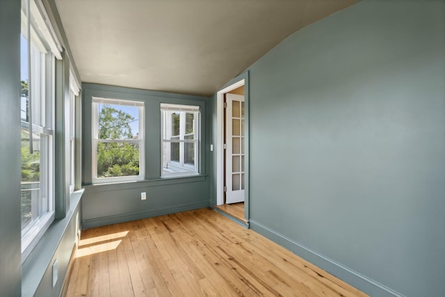 23-25 Deerfield Rd, Portland, ME 04101 - unfurnished sunroom with vaulted ceiling