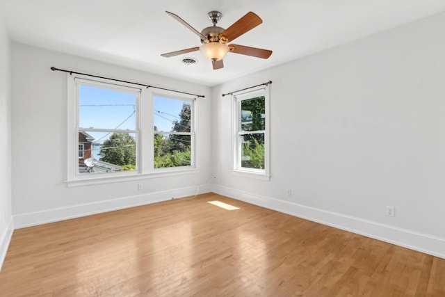 23-25 Deerfield Rd, Portland, ME 04101 - empty room with baseboards, light wood finished floors, and ceiling fan