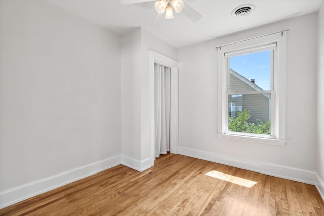 23-25 Deerfield Rd, Portland, ME 04101 - empty room featuring baseboards, light wood-type flooring, healthy amount of natural light, and ceiling fan