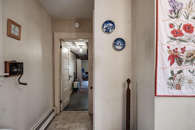 corridor featuring wallpapered walls