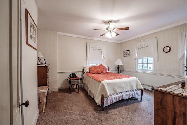 bedroom with wallpapered walls, ceiling fan, carpet floors, and a baseboard heating unit