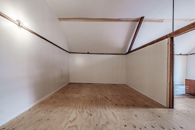 interior space featuring vaulted ceiling