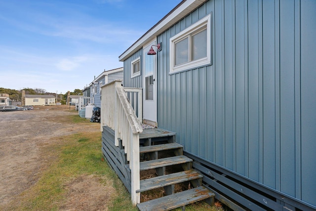 property entrance with board and batten siding