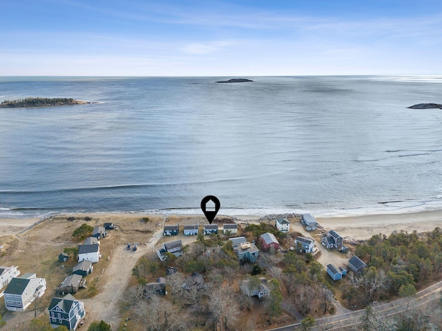 bird's eye view with a beach view and a water view