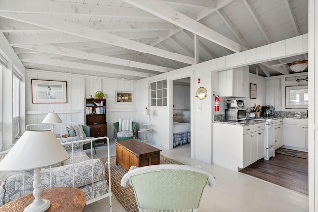 living area with vaulted ceiling with beams, dark wood-style flooring, a toaster, and wood ceiling