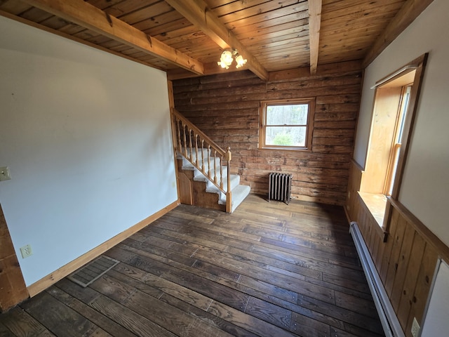 369 Hawes Bridge Rd, Prospect, ME 04981 - spare room with radiator, stairs, dark wood-style floors, wood ceiling with exposed beams, and a chandelier