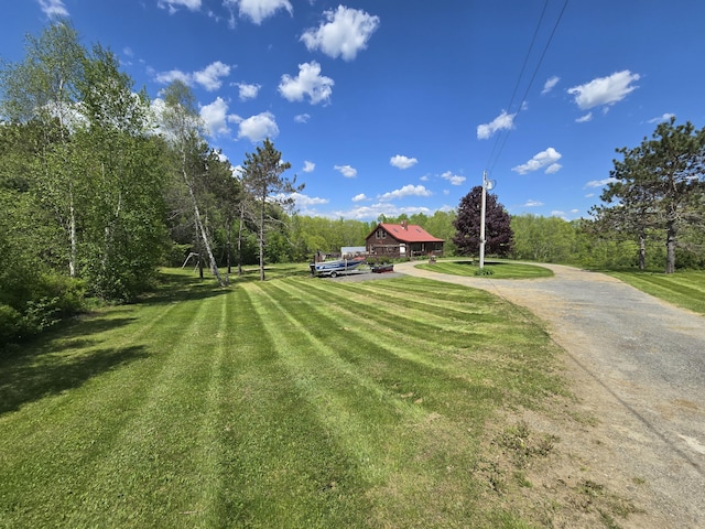 369 Hawes Bridge Rd, Prospect, ME 04981 - view of green lawn featuring driveway