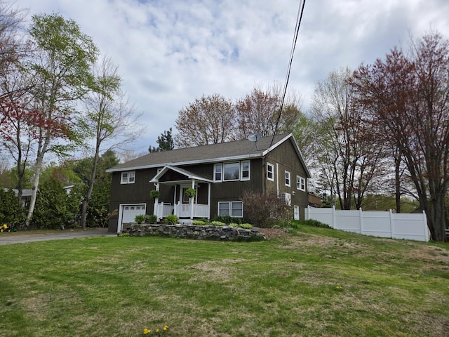 134 Minuteman Dr, Millinocket, ME 04462 - split foyer home featuring a garage, driveway, and covered porch