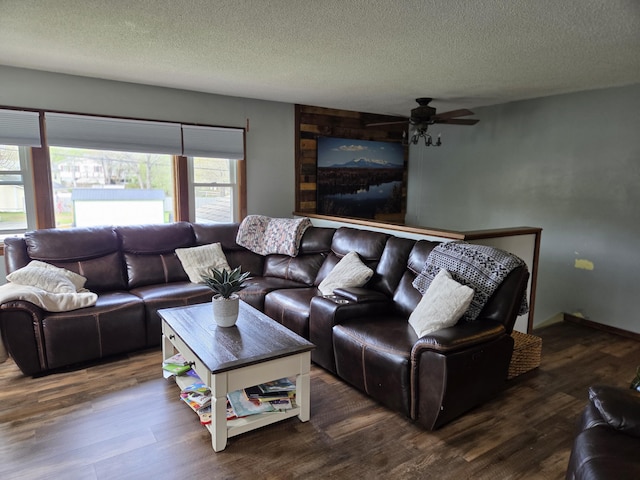 134 Minuteman Dr, Millinocket, ME 04462 - living room with a ceiling fan, a textured ceiling, and wood finished floors