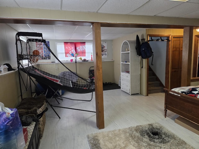 134 Minuteman Dr, Millinocket, ME 04462 - bedroom featuring light wood-style flooring and a paneled ceiling